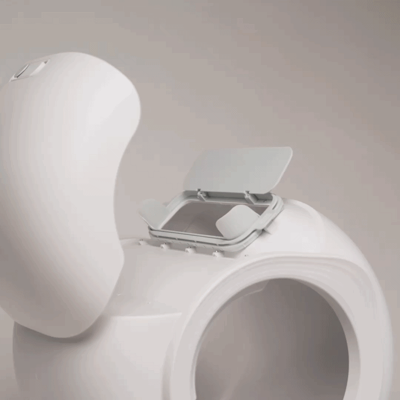 Weighted waste flap with magnetic closure